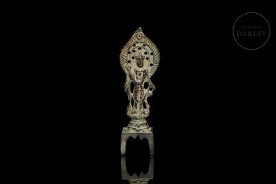 Small bronze figure ‘Deity’, 20th century. Small votive metal figure, possibly gilded bronze 