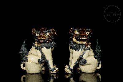 Pair of ceramic figures ‘Komainu’, Japan, 20th century. Modelled ceramic decorated with a 