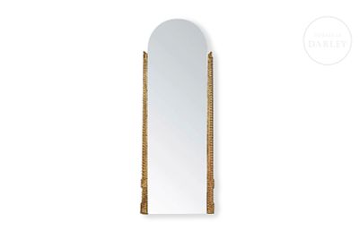 Mirror with carved wooden frame, Indonesia, 20th century. Vertical mirror with a semicircular 