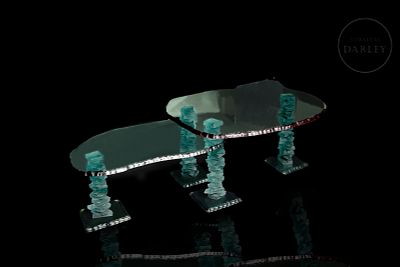 Glass table in the style of Danny Lane, 20th century. Modernist design table composed of four 