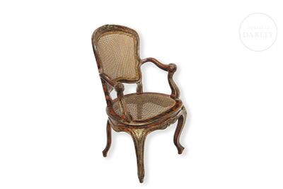 Louis XV style cane armchair, late 19th century. Louis XV style carved wooden chair with 