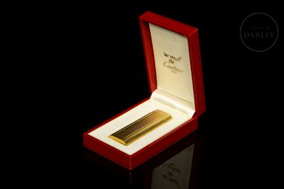 Lighter ‘Cartier, Les Must’, 18k gold-plated. Art Deco style pocket lighter, rectangular case 