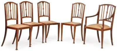 Conjunto de cuatro sillas y una butaca eduardinas en madera de caoba con fileteado de 