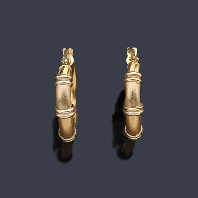 : Criollas en montura de oro amarillo de 18K mate y brillo. Criollas en montura de oro amarillo 