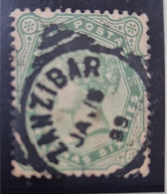 INDIA USED IN ZANZIBAR
4 1/2 Annas , Green, SG #97,centrally cancelled in squared circle.