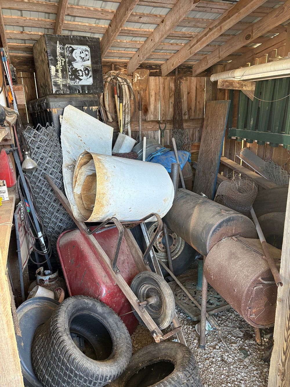 Lot 409: Shed Contents Including Rolls Of Wire Fencing, Plastic Dog Kennel, Smoker, Assorted Tires, Hand
