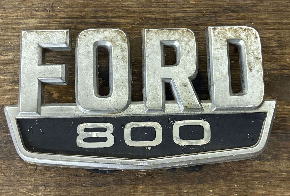 Lot 200: Vintage Ford 800 Emblem 7"X4"X1"
