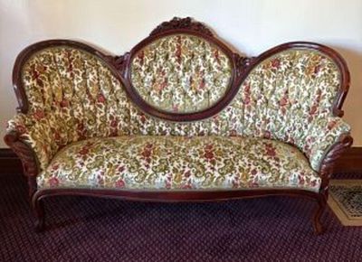 Antique Victorian-Style Settee or Parlor Sofa with a Medallion/Cameo Tufted back on Ornate Hand 