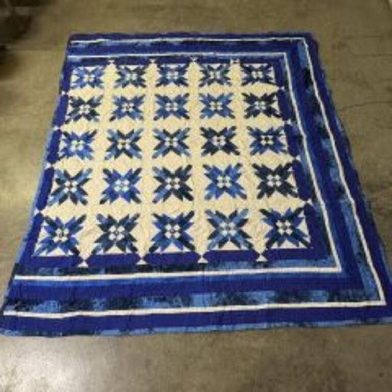 Lot 502: Vintage Handsewn Blue and White Quilt in a...
