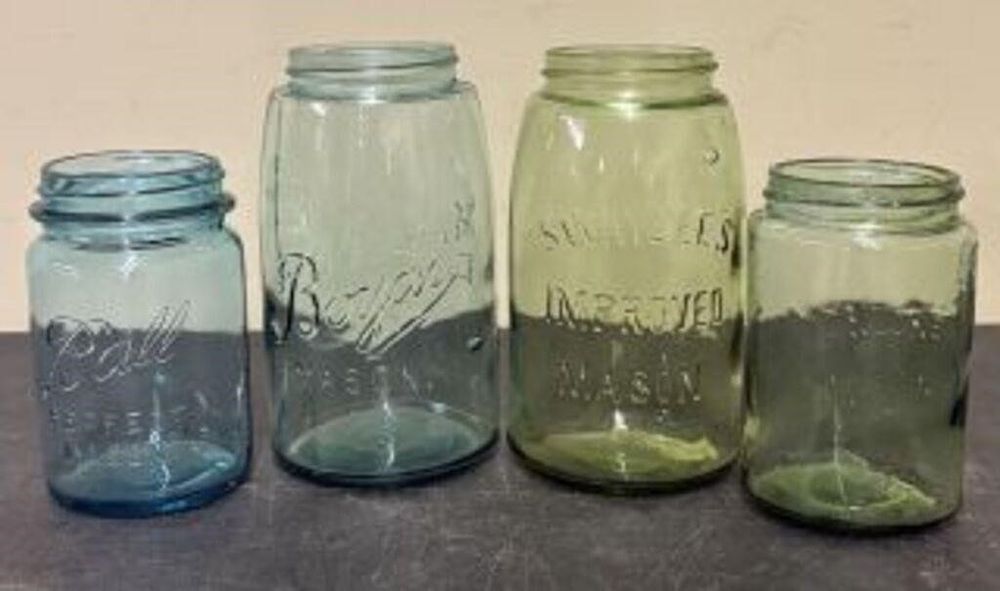 Lot 577: Lot Of 4 Assorted Mason Jars 3.5"X7"