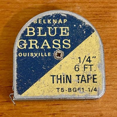 Vintage Belknap Bluegrass 6-Foot Steel Pocket Tape Measure 2". This is a mid-20th century 