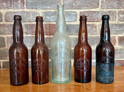 A Collection of Five Pre-Prohibition Embossed Louisville Kentucky Beer Bottles 3"X12". This 