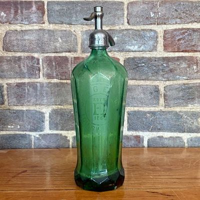 John G. Epping Emerald Green Faceted Glass Soda Siphon, Louisville, Kentucky 4"X13". This is an 
