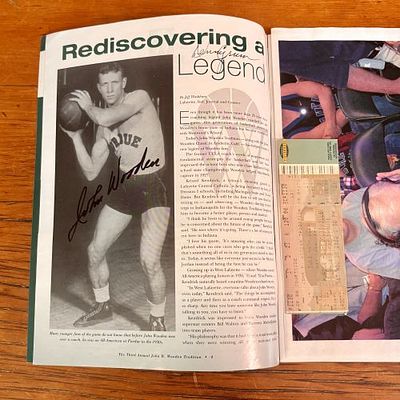 John Wooden and Denny Crum Dual Signed 2002 John R. Wooden Tradition Program with Courtside Ticket. 