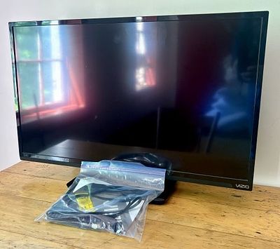 Vizio E320-A1 32-Inch 720p LED HDTV 8"X29"X20". Vizio 32-inch class LED HDTV, model number 