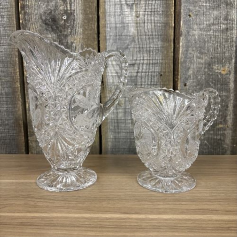 A Pair of Lead Cut Crystal Pitchers with Frosted Bird Medallions