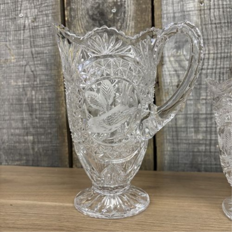 A Pair of Lead Cut Crystal Pitchers with Frosted Bird Medallions