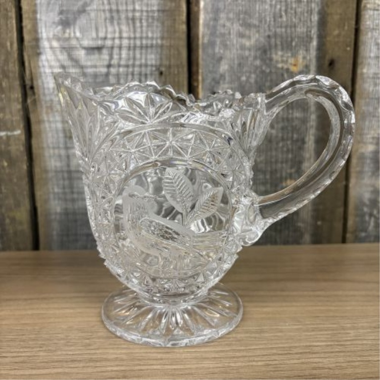 A Pair of Lead Cut Crystal Pitchers with Frosted Bird Medallions