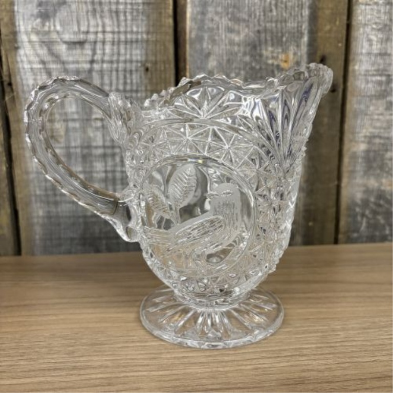 A Pair of Lead Cut Crystal Pitchers with Frosted Bird Medallions