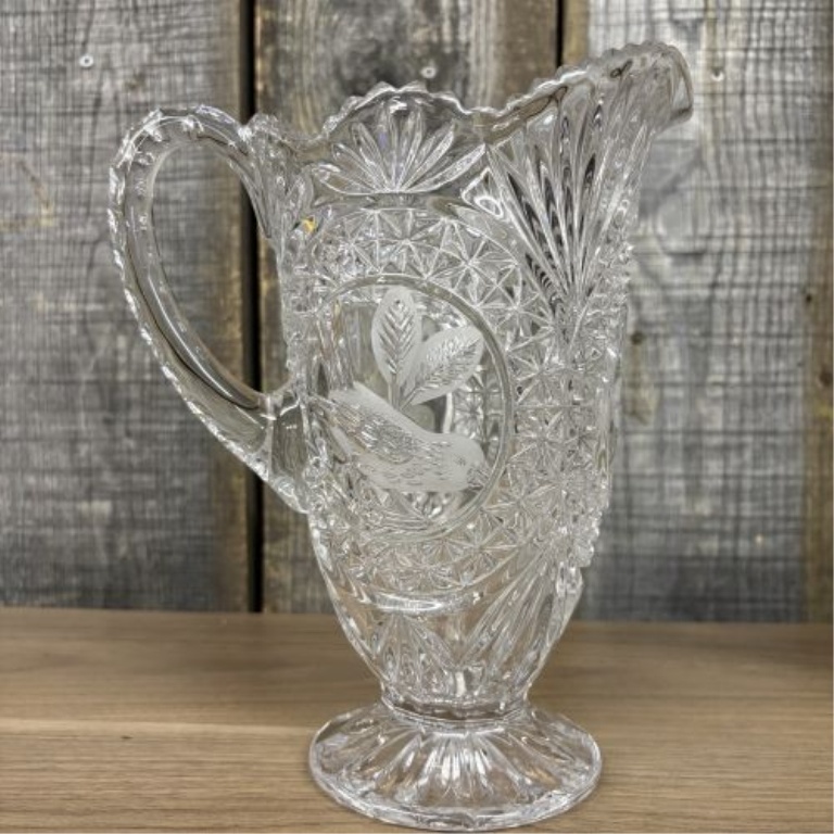 A Pair of Lead Cut Crystal Pitchers with Frosted Bird Medallions