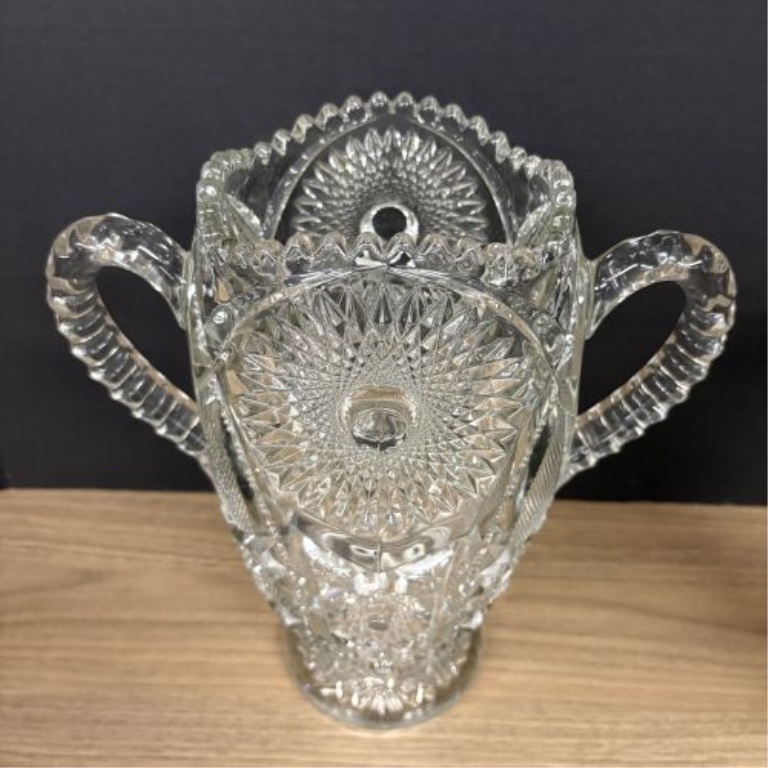 Two Pieces of Clear Decorative Glass Including an American Brilliant Period Style Cut Glass Loving Cup and a Ribbed Pedestal Compote
