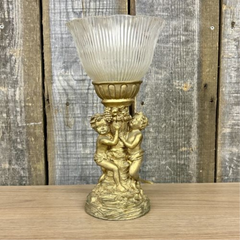 A Classical Style Putti Motif Table Lamp and a Ceramic Stoneware Jug