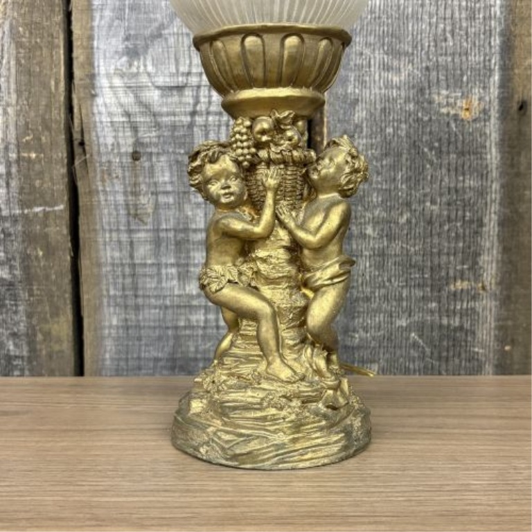 A Classical Style Putti Motif Table Lamp and a Ceramic Stoneware Jug