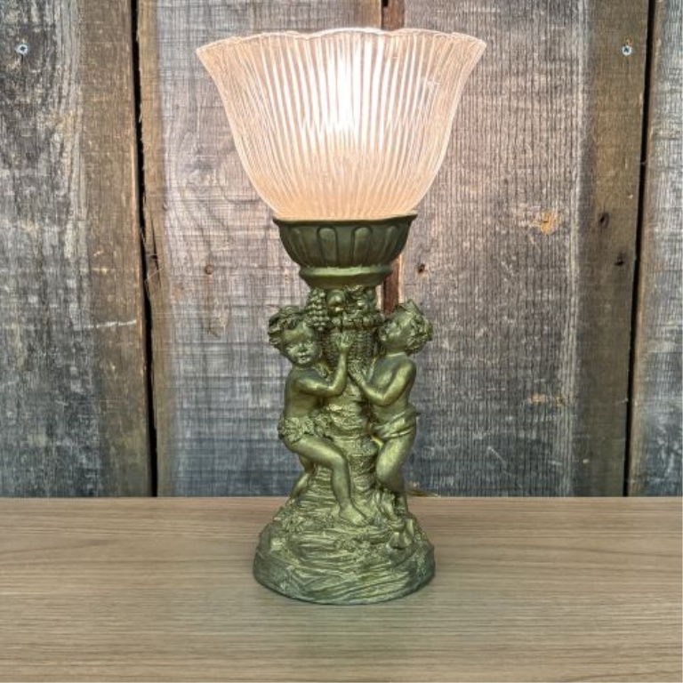 A Classical Style Putti Motif Table Lamp and a Ceramic Stoneware Jug