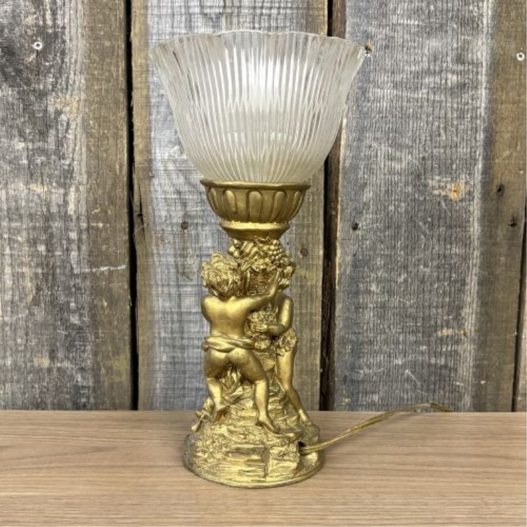 A Classical Style Putti Motif Table Lamp and a Ceramic Stoneware Jug