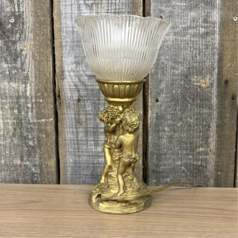 A Classical Style Putti Motif Table Lamp and a Ceramic Stoneware Jug