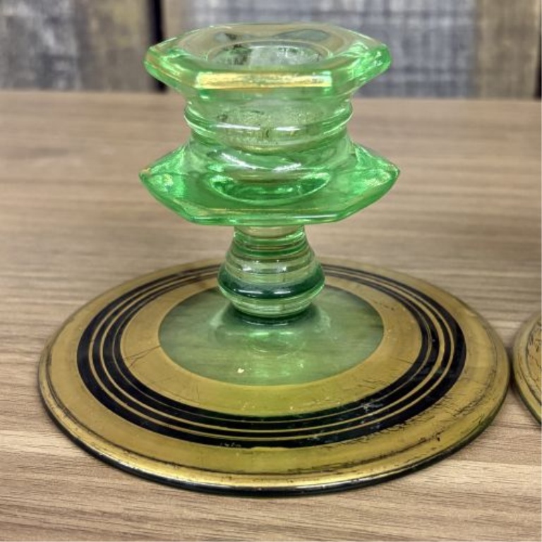 A Pair of Art Deco Green Uranium Glass Candlesticks with Gilt and Enamel Decoration