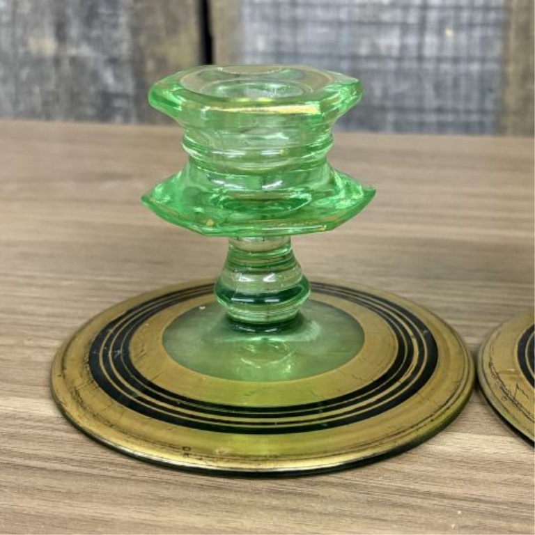 A Pair of Art Deco Green Uranium Glass Candlesticks with Gilt and Enamel Decoration