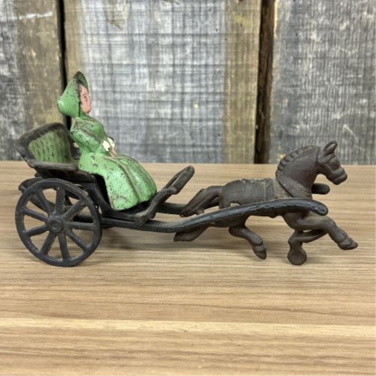 Horse-Drawn Buggy with Seated Female Figure