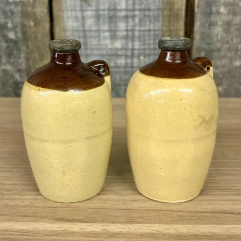 A Pair of Miniature USA Two-Tone Stoneware Whiskey Jug Salt and Pepper Shakers