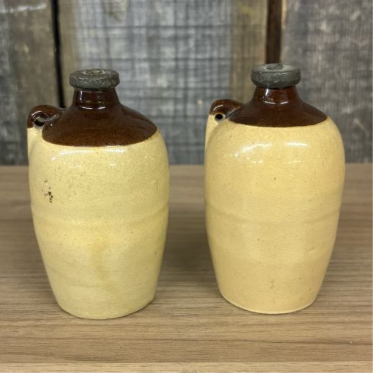 A Pair of Miniature USA Two-Tone Stoneware Whiskey Jug Salt and Pepper Shakers