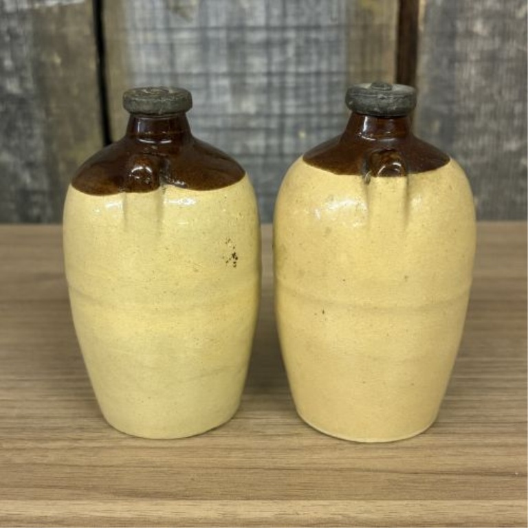 A Pair of Miniature USA Two-Tone Stoneware Whiskey Jug Salt and Pepper Shakers