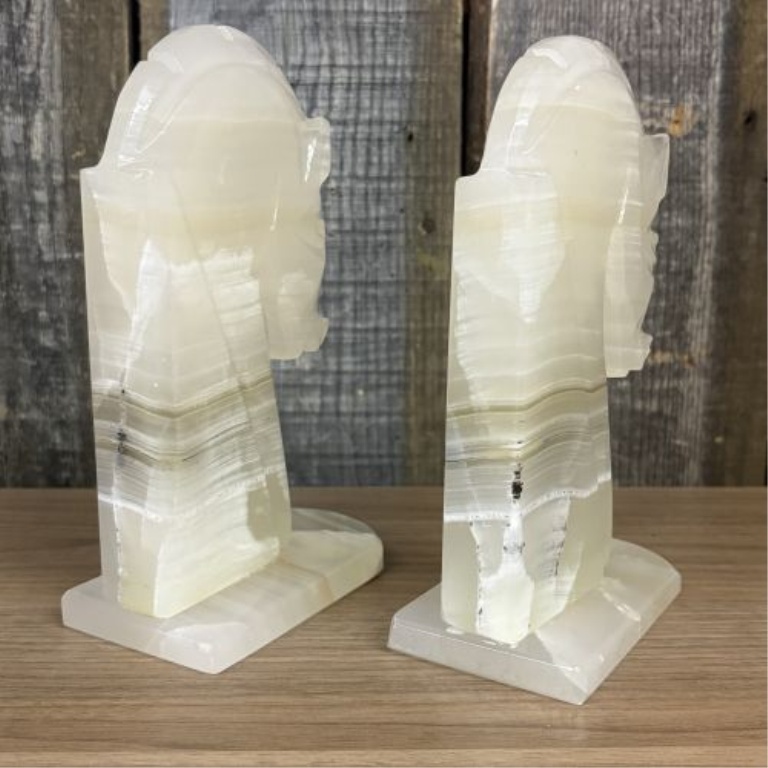 A Pair of Art Deco Style Hand Carved Banded Onyx Horse Head Bookends