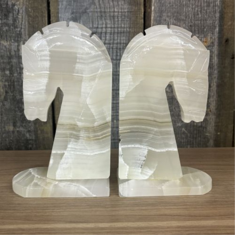 A Pair of Art Deco Style Hand Carved Banded Onyx Horse Head Bookends