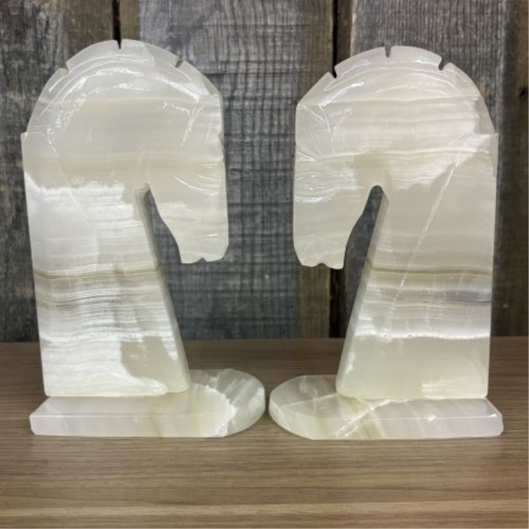 A Pair of Art Deco Style Hand Carved Banded Onyx Horse Head Bookends