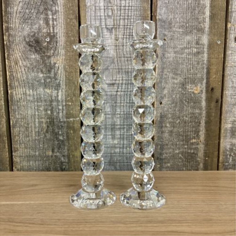 A Pair of Tall Faceted Stacked Crystal Taper Candlesticks