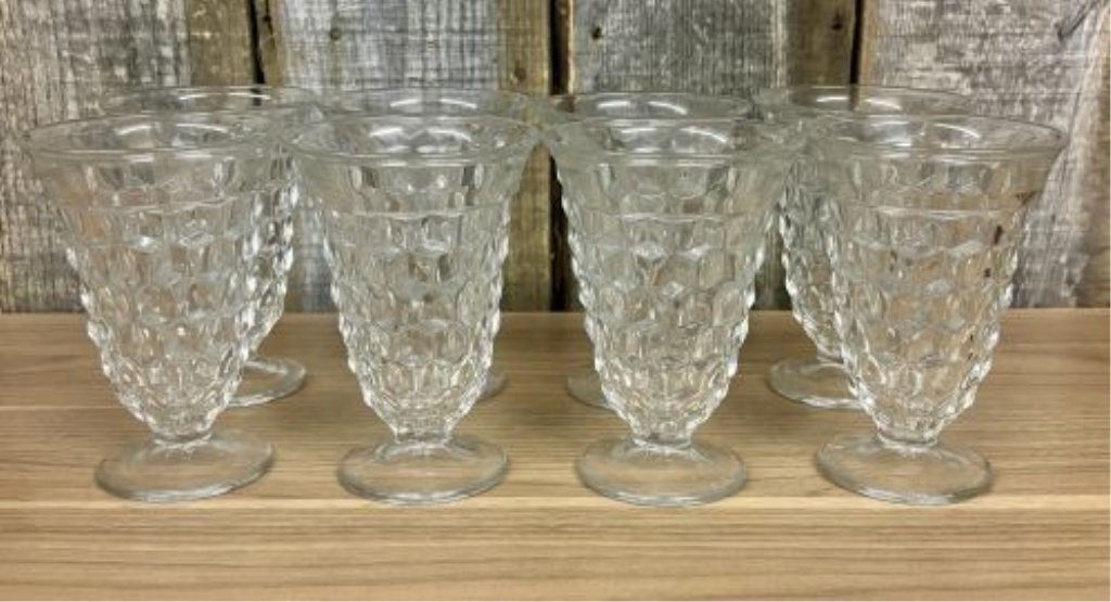 A Set of Eight Clear Pressed Glass Footed Iced Tea Tumblers in the Cube Pattern