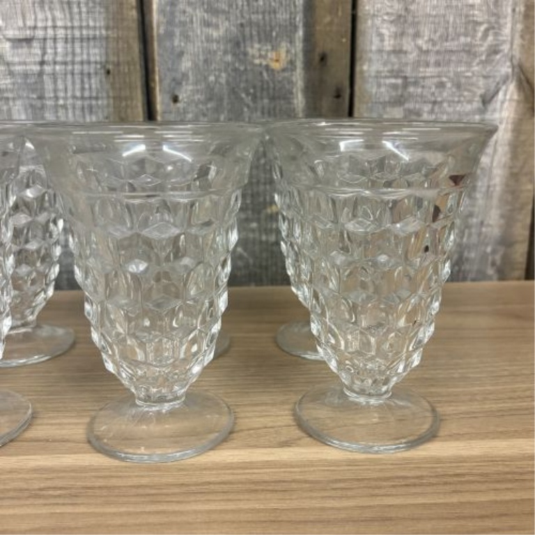 A Set of Eight Clear Pressed Glass Footed Iced Tea Tumblers in the Cube Pattern