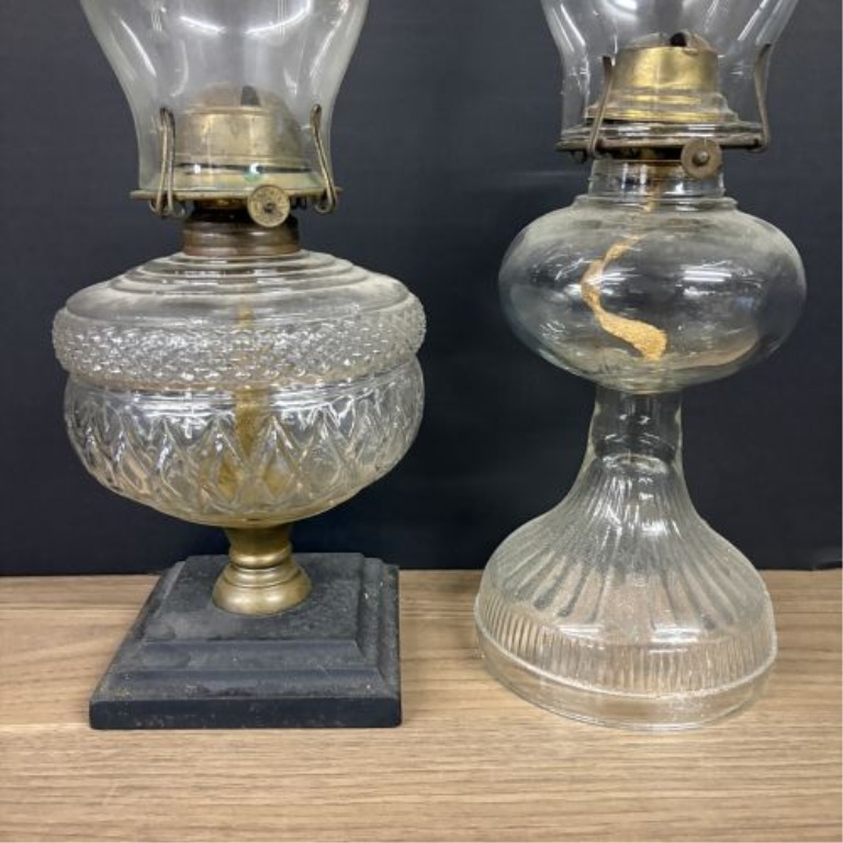 Two Antique Glass Kerosene Oil Lamps Including One with Cast Iron Base
