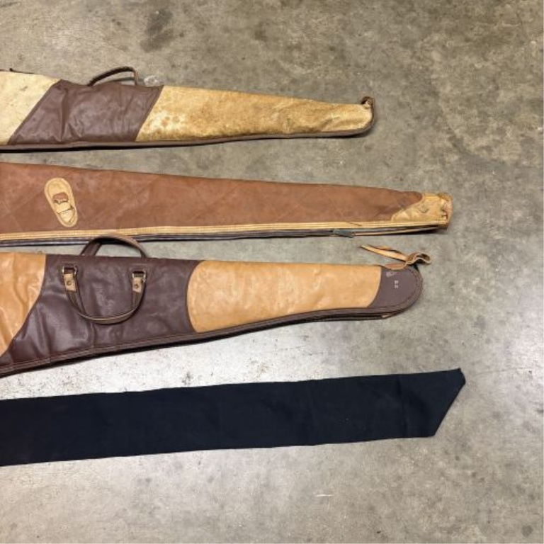 A Collection of Soft Gun Cases and a Protective Sleeve