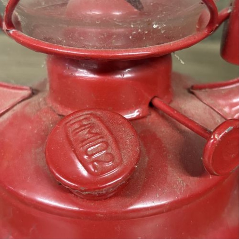 A Collection of Vintage Red Kerosene Lanterns