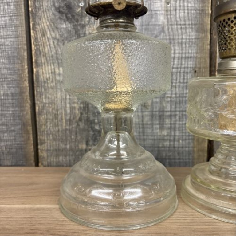 A Pair of American Vintage Pressed Glass Oil Lamps including Plume and Atwood