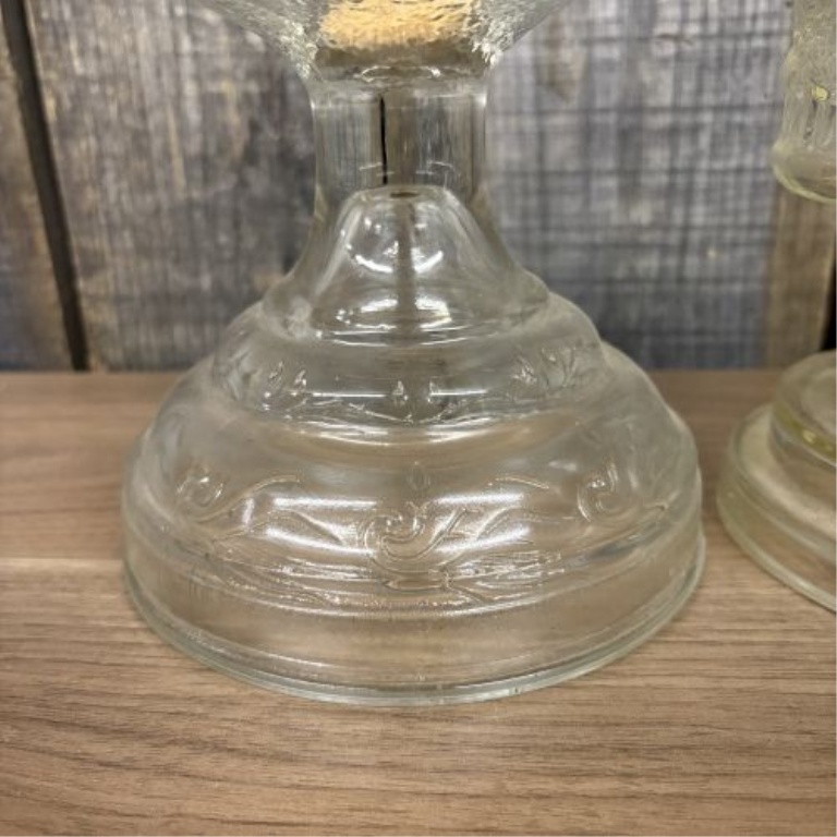 A Pair of American Vintage Pressed Glass Oil Lamps including Plume and Atwood
