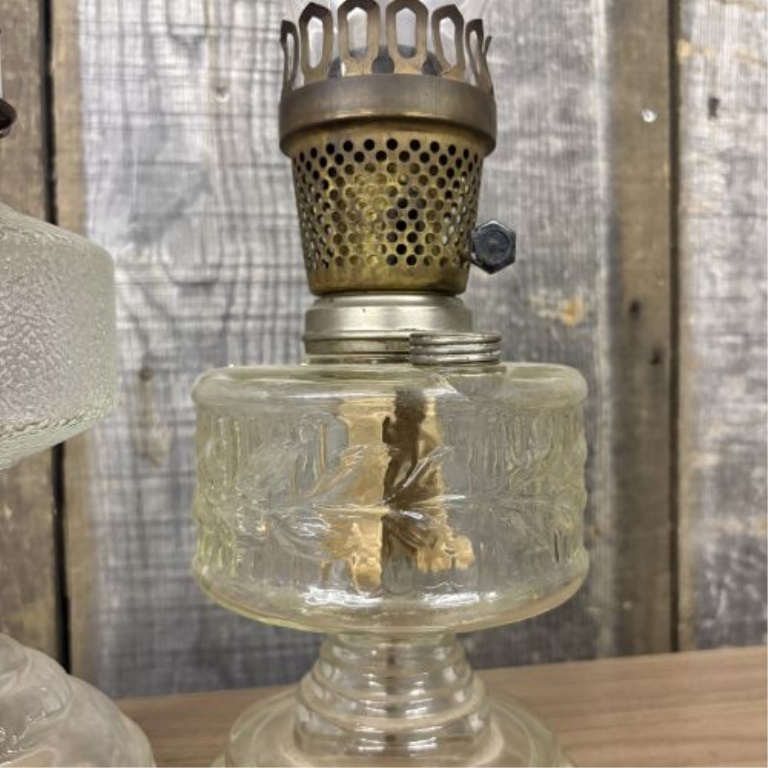 A Pair of American Vintage Pressed Glass Oil Lamps including Plume and Atwood