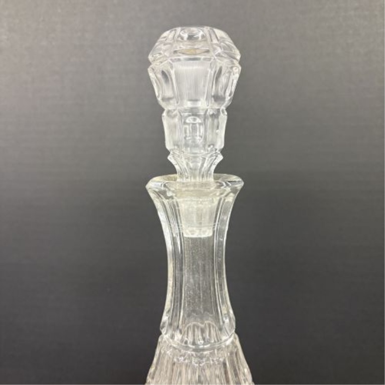 A Trio of Assorted Vintage Clear Glass Decanters