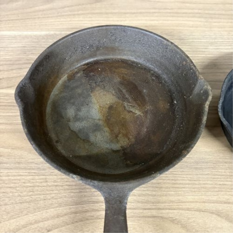 A Pair of Vintage American Cast Iron Skillets
